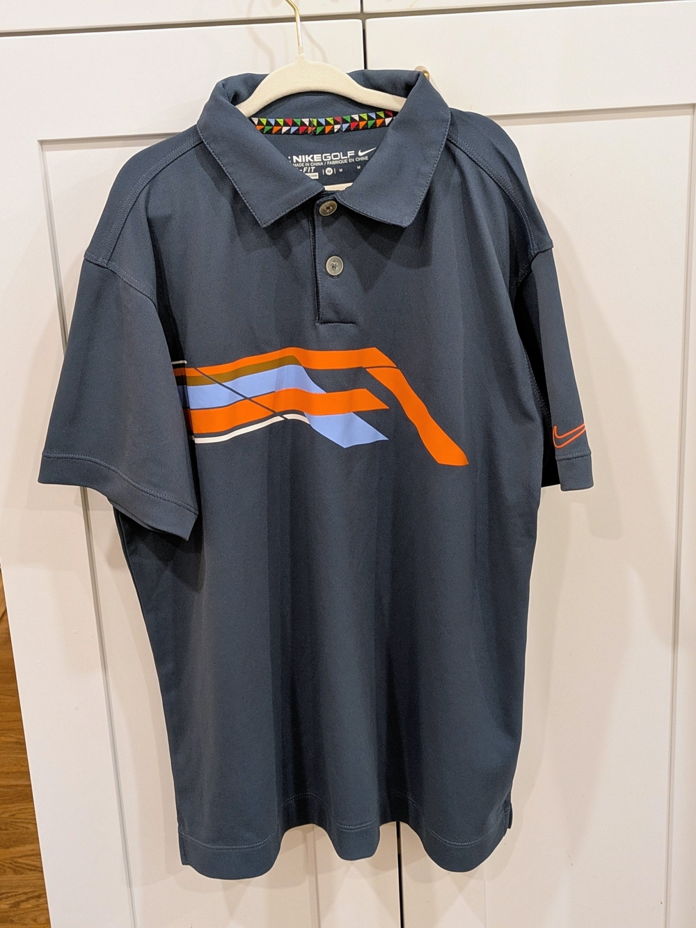Nike Kids Polo with Orange Accent